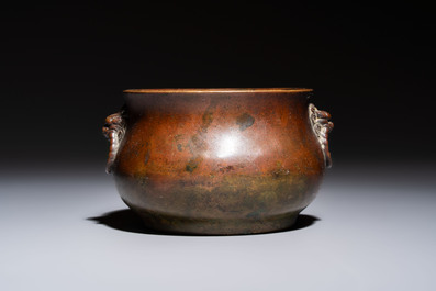 A Chinese bronze censer with lion-head handles and relief dragon design, Lu Gu Zhai 侶古齋 mark, 18/19th C.