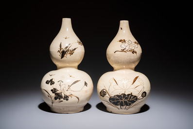 A pair of Chinese Cizhou double gourd vases, Ming