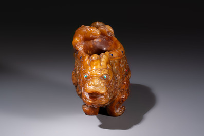 A Chinese precious-stone-inlaid carved soapstone wine vessel on stand, Gong 觥, Republic