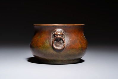 A Chinese bronze censer with lion-head handles and relief dragon design, Lu Gu Zhai 侶古齋 mark, 18/19th C.