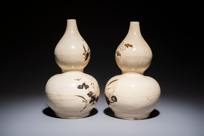 A pair of Chinese Cizhou double gourd vases, Ming