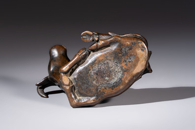 A Chinese bronze 'Boy and Buffalo' paperweight, Ming