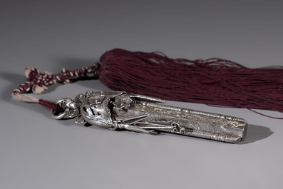 A fine Chinese silver pendant with inscriptions on a plexiglas stand, 19th C.