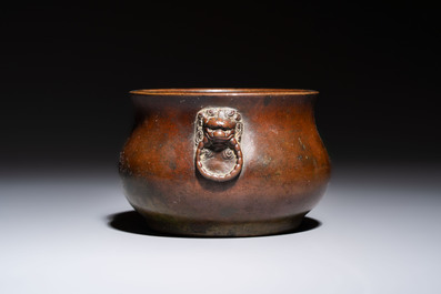 A Chinese bronze censer with lion-head handles and relief dragon design, Lu Gu Zhai 侶古齋 mark, 18/19th C.