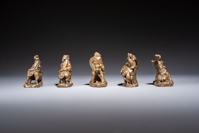 Five Chinese bronze 'Immortal' groups and a carved soapstone 'Monkeys' sculpture, 20th C.