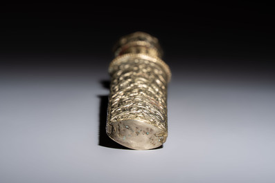A Tibetan white metal 'Buddhist Symbols' dagger and scabbard, first half 20th C.