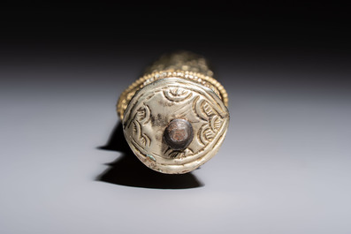 A Tibetan white metal 'Buddhist Symbols' dagger and scabbard, first half 20th C.