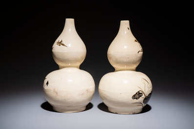 A pair of Chinese Cizhou double gourd vases, Ming