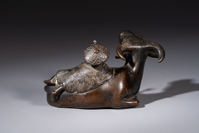 A Chinese bronze 'Boy and Buffalo' paperweight, Ming