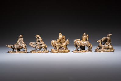 Five Chinese bronze 'Immortal' groups and a carved soapstone 'Monkeys' sculpture, 20th C.