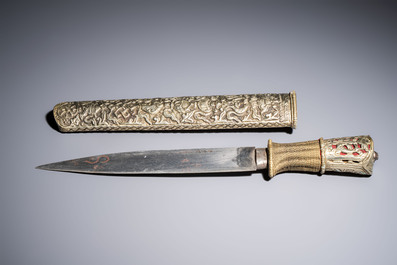 A Tibetan white metal 'Buddhist Symbols' dagger and scabbard, first half 20th C.