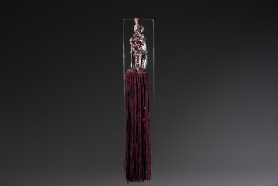 A fine Chinese silver pendant with inscriptions on a plexiglas stand, 19th C.