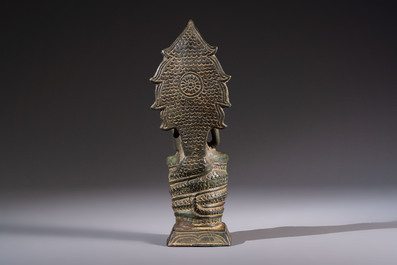 A Cambodian bronze Buddha and a Thai Buddha head, 19th C.