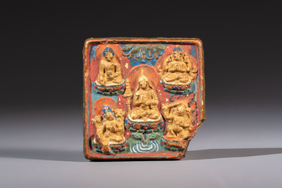 A gilt polychrome stucco votive plaque, Tsha Tsha, Tibet, 18/19th C.