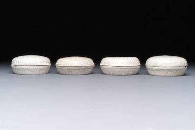 Four Chinese white-glazed boxes and covers with incised floral design from the Jepara shipwreck, Dehua or Anxi kiln, Song