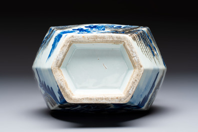A Chinese blue, white and copper-red 'Hu' vase with figures in a mountainous landscape, 19th C.
