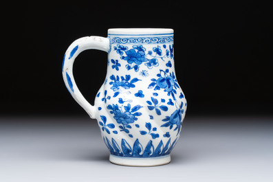 A Chinese blue and white twisted jug with floral design, Kangxi