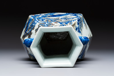 A Chinese blue, white and copper-red 'Hu' vase with figures in a mountainous landscape, 19th C.
