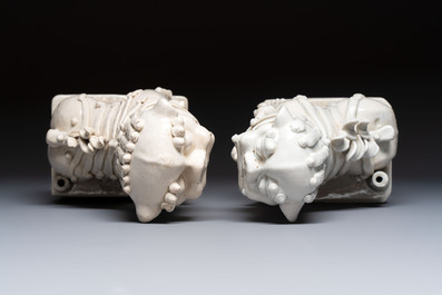 A pair of large Chinese Dehua blanc de Chine buddhist lion joss stick holders, 19th C.