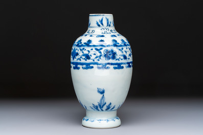 A Chinese blue and white 'Floral' jug, Transitional period