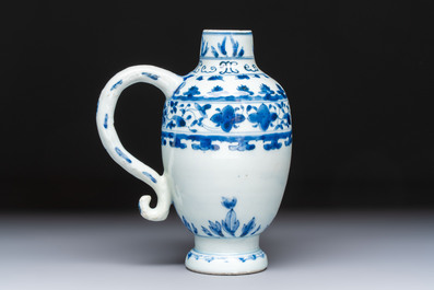 A Chinese blue and white 'Floral' jug, Transitional period