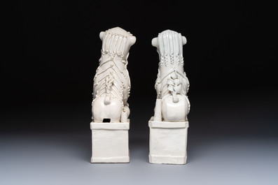 A pair of large Chinese Dehua blanc de Chine buddhist lion joss stick holders, 19th C.