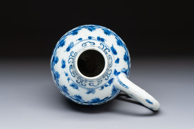 A Chinese blue and white 'Floral' jug, Transitional period
