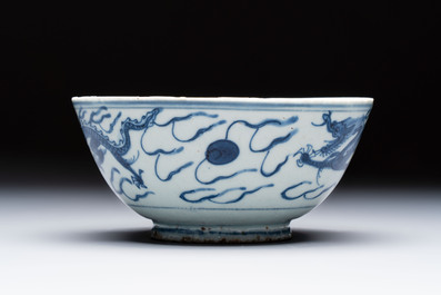 A Chinese blue and white 'Dragons and Clouds' bowl, Jiajing/Wanli