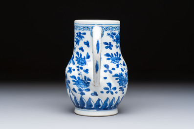 A Chinese blue and white twisted jug with floral design, Kangxi