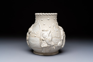 A Chinese Nanking white-glazed 'hu' vase with figural relief design, 19th C.