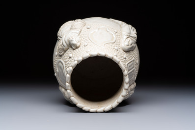 A Chinese Nanking white-glazed 'hu' vase with figural relief design, 19th C.