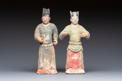 Three Chinese cold painted pottery figures, Sui/Ming