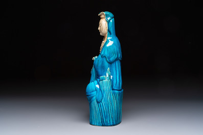 A Chinese turquoise-glazed Guanyin, a white-glazed bottle vase and a blue and white jar, 19th C.