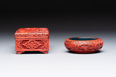 A pair of Chinese cinnabar lacquer bookends, a covered box and a brush washer, 19/20th C.
