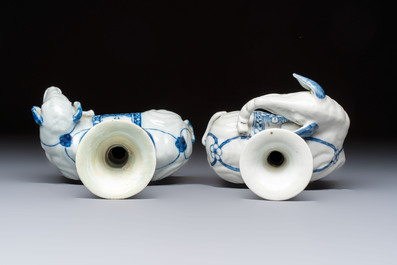 Two Chinese blue and white recumbent elephant-form candlesticks, Jiaqing