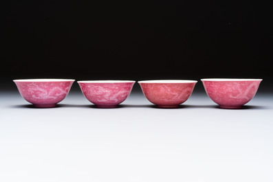 Four Chinese sgraffito ruby-ground 'Dragon' cups and three plates, Qianlong mark, Republic
