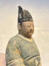 Three Chinese cold painted pottery figures, Sui/Ming