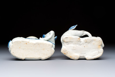 Two Chinese blue and white recumbent elephant-form candlesticks, Jiaqing