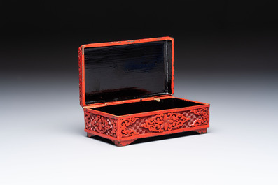A pair of Chinese cinnabar lacquer bookends, a covered box and a brush washer, 19/20th C.