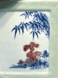 A Chinese blue, white and copper-red celadon-ground tea caddy with floral and bamboo design, Qianlong mark and of the period