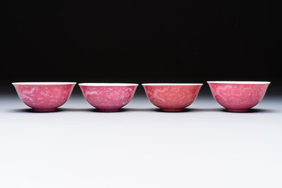 Four Chinese sgraffito ruby-ground 'Dragon' cups and three plates, Qianlong mark, Republic