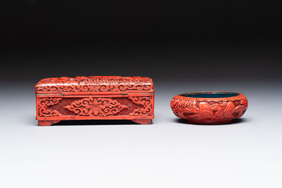 A pair of Chinese cinnabar lacquer bookends, a covered box and a brush washer, 19/20th C.