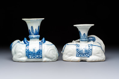 Two Chinese blue and white recumbent elephant-form candlesticks, Jiaqing