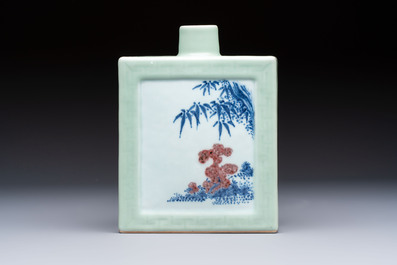 A Chinese blue, white and copper-red celadon-ground tea caddy with floral and bamboo design, Qianlong mark and of the period