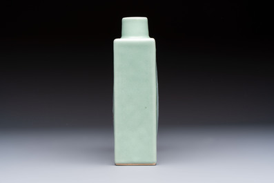 A Chinese blue, white and copper-red celadon-ground tea caddy with floral and bamboo design, Qianlong mark and of the period