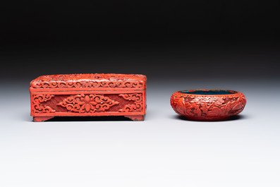 A pair of Chinese cinnabar lacquer bookends, a covered box and a brush washer, 19/20th C.
