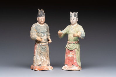 Three Chinese cold painted pottery figures, Sui/Ming