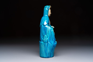 A Chinese turquoise-glazed Guanyin, a white-glazed bottle vase and a blue and white jar, 19th C.