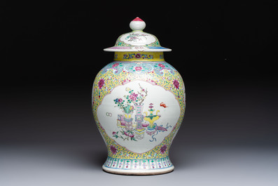 A Chinese famille rose vase and cover with birds among flowering branches, 19th C.