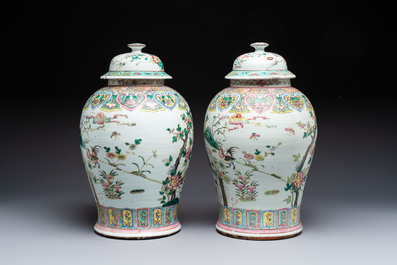 A pair of Chinese famille rose 'Roosters' vases and covers, 19th C.